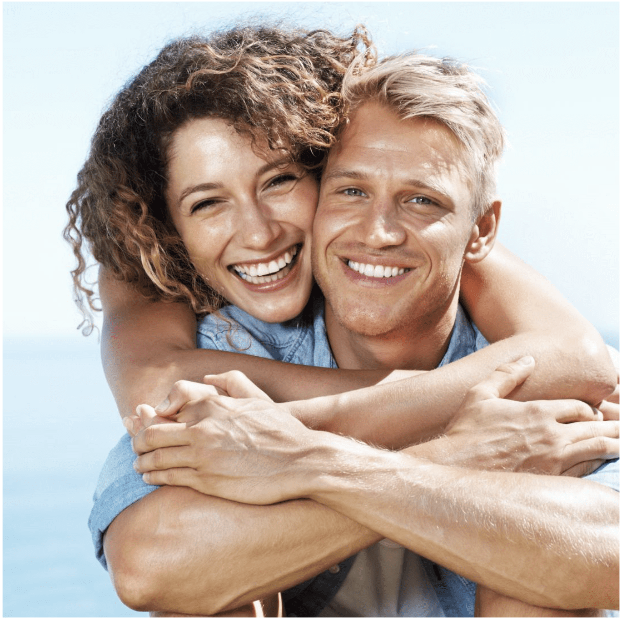 couple smiling after the dentist