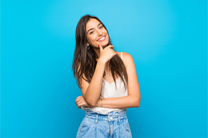 Happy, smiling young adult woman