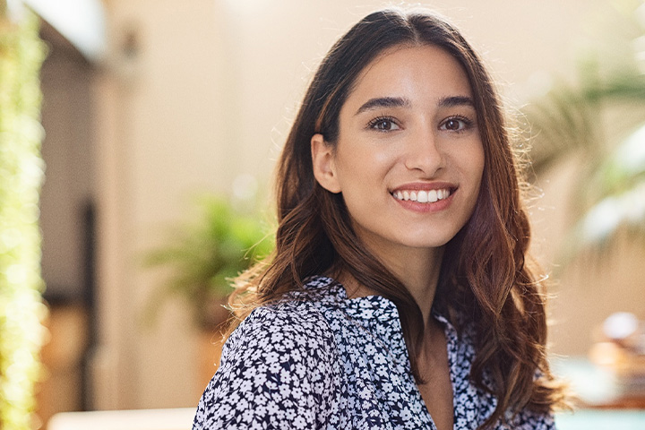 A happy young woman smiling