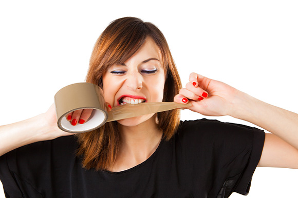 Patient in Lexington biting tape