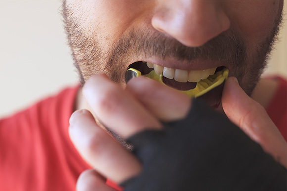 Patient in Lexington wearing a mouthguard