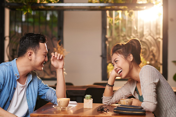 Lexington Invisalign patient smiling on a date