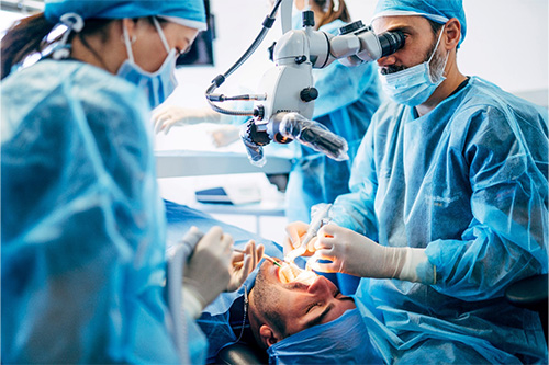 Patient undergoing dental implant surgery.