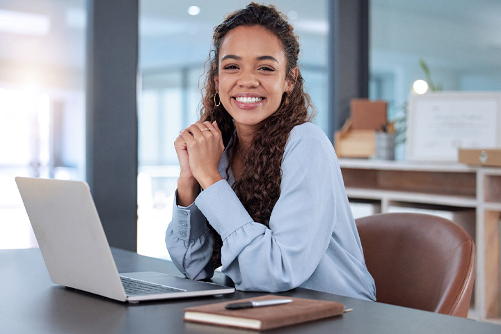 Lady smiles at work.